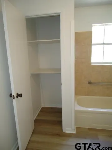 a bathroom with a bathtub