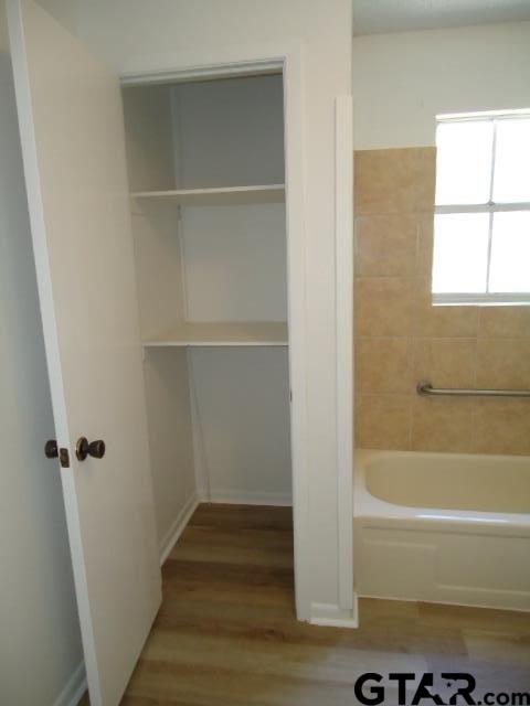 16994-c R 223 C R 223 Arp, TX 75750 - Photo 29 of 38 a bathroom with a bathtub