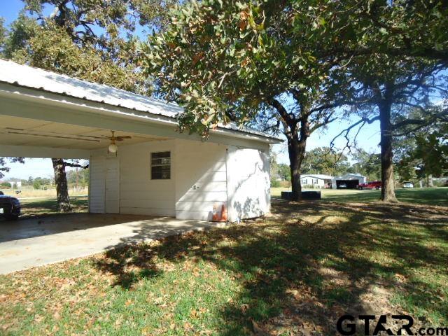 16994-c R 223 C R 223 Arp, TX 75750 - Photo 32 of 38 a view of a yard with car parked