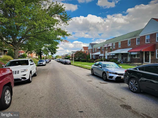 a car parked in front of a house