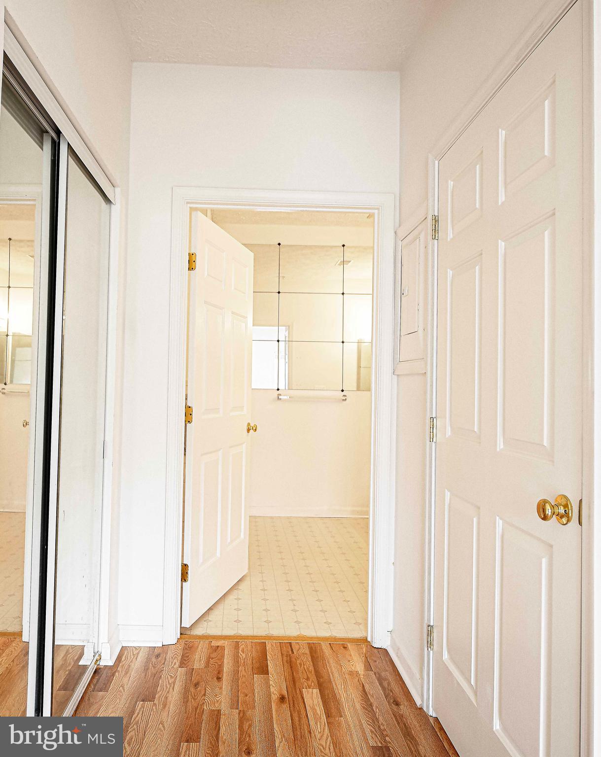 9606 Haven Farm Road, Unit E Perry Hall, MD 21128 - Photo 30 of 33 a view of a room with wooden floor and entryway