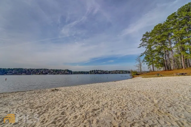 a view of a pool with a yard