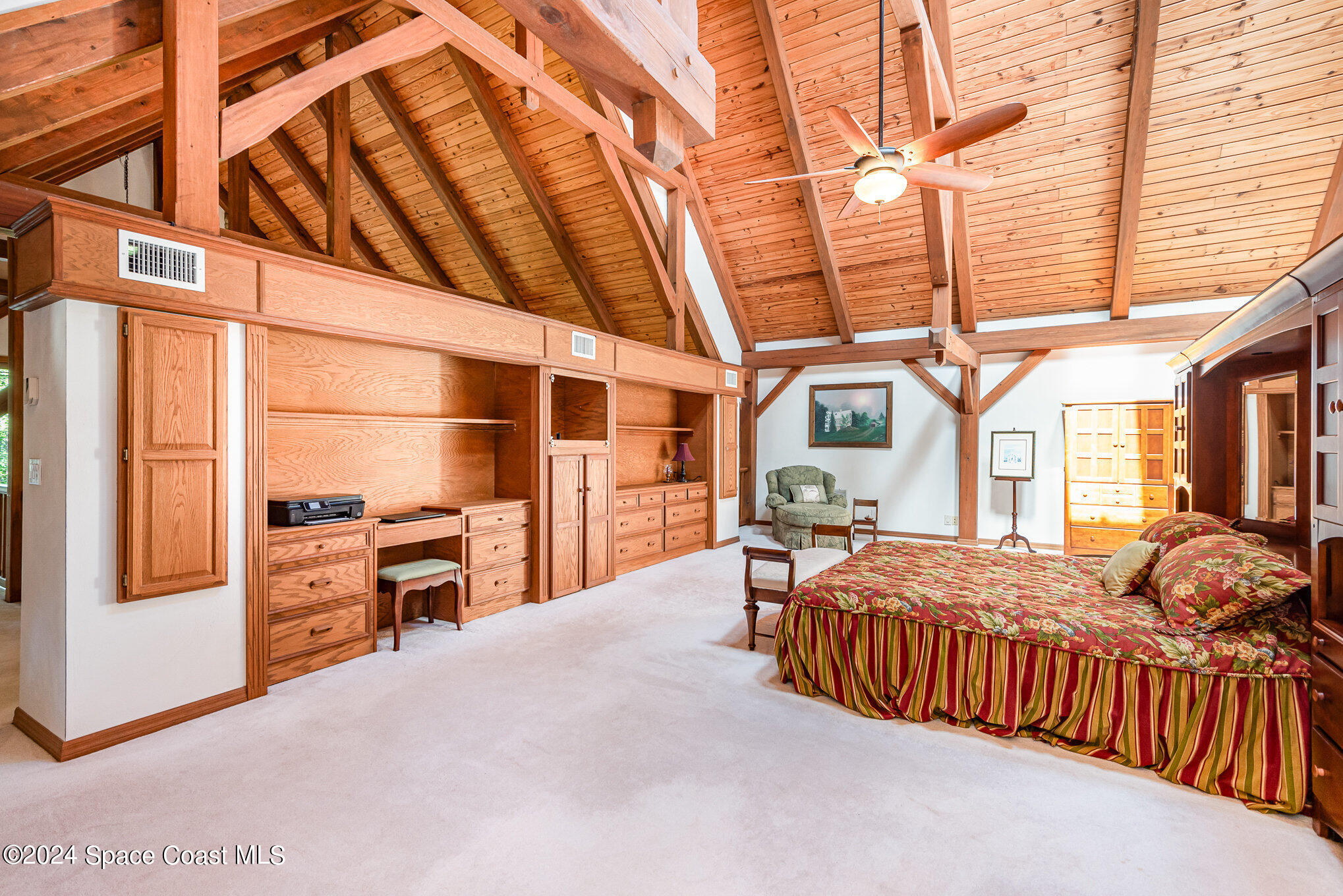 3450 Grant Line Road Mims, FL 32754 - Photo 11 of 42 a bedroom with furniture and large window