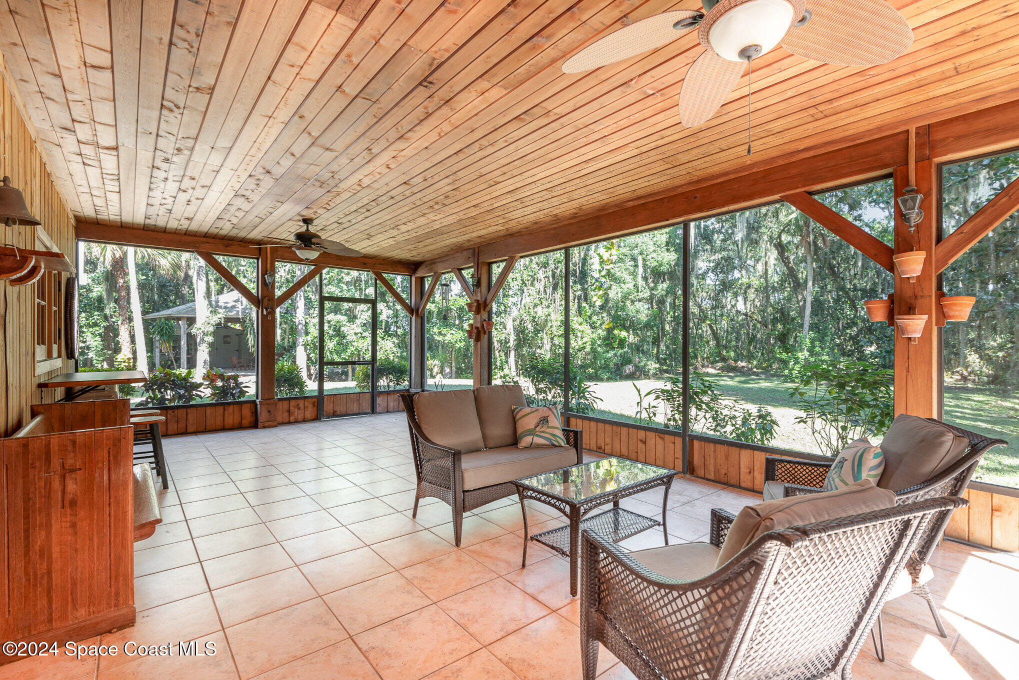 3450 Grant Line Road Mims, FL 32754 - Photo 34 of 42 a outdoor space with patio the couches and chairs