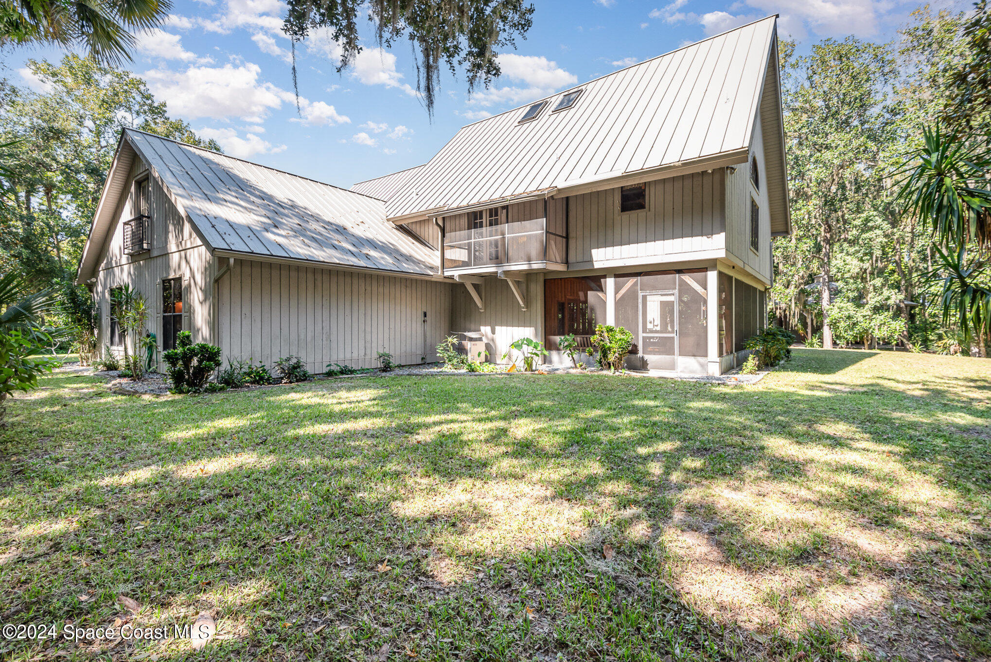 3450 Grant Line Road Mims, FL 32754 - Photo 36 of 42 a front view of house with yard