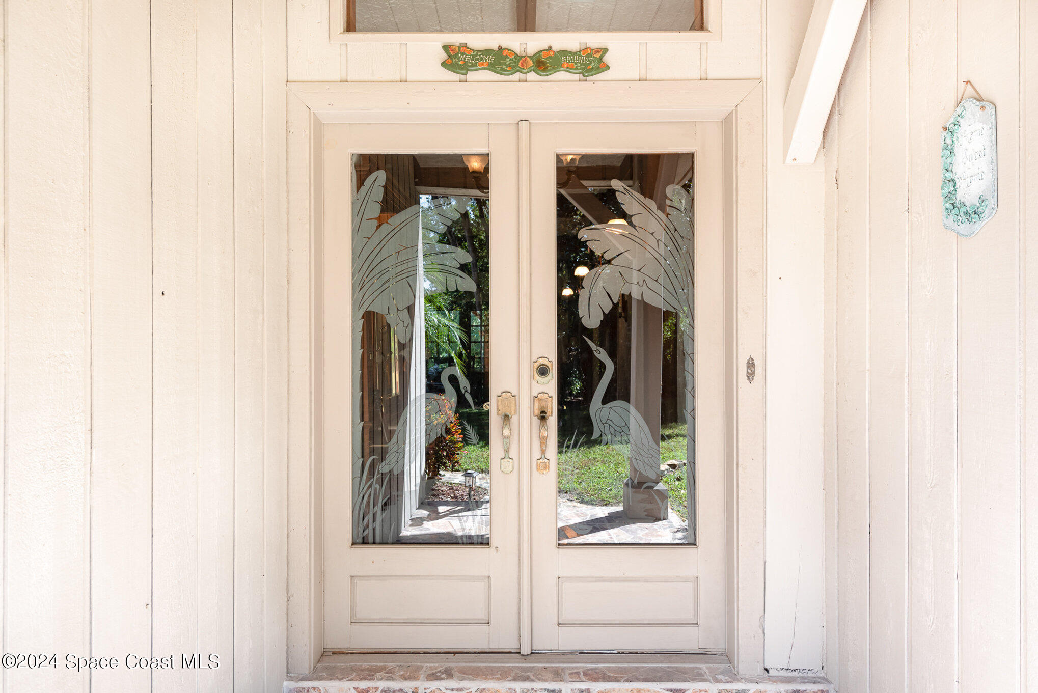 3450 Grant Line Road Mims, FL 32754 - Photo 5 of 42 a view of a door and a window