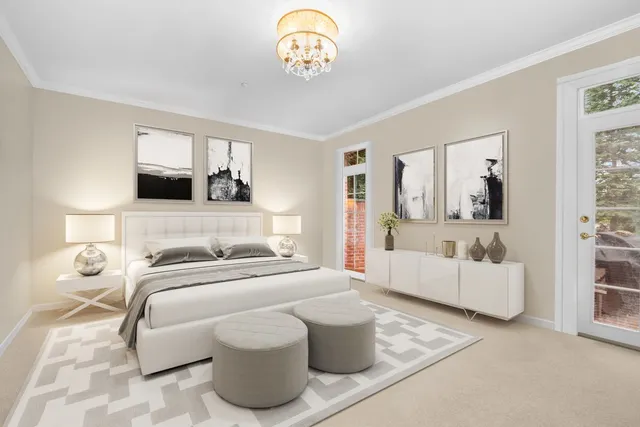 a bedroom with a bed and a couch