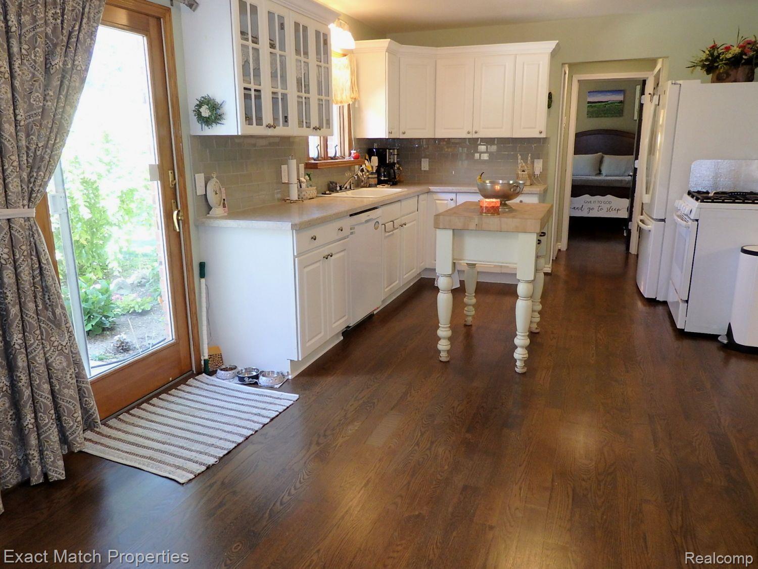 2980 East Rose Center Road Highland, MI 48356 - Photo 29 of 72 Beautiful kitchen and patio access