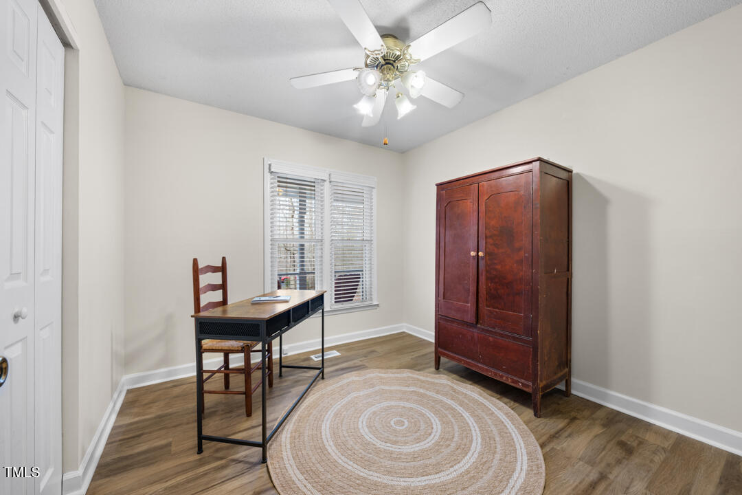 1008 Torredge Road Durham, NC 27712 - Photo 23 of 31 a view of a livingroom with furniture and hardwood floor