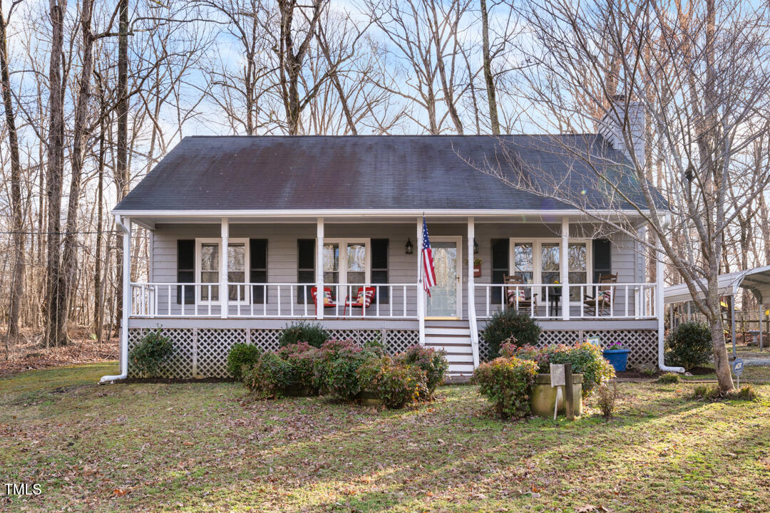 1008 Torredge Road Durham, NC 27712 - Photo 2 of 31 a front view of a house with a yard