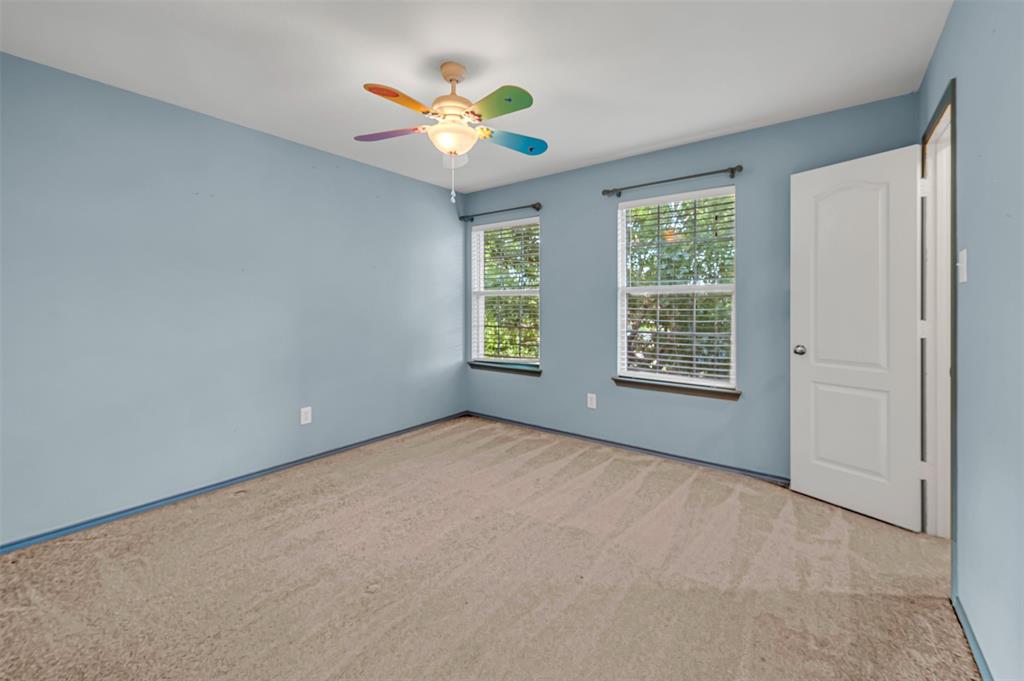 9017 Graywolf Ridge Trail Fort Worth, TX 76244 - Photo 18 of 27 Unfurnished room with carpet and ceiling fan