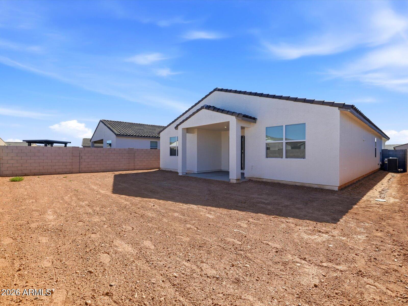 2392 Grenache Road San Tan Valley, AZ 85143 - Photo 27 of 67 a view of a house with a yard
