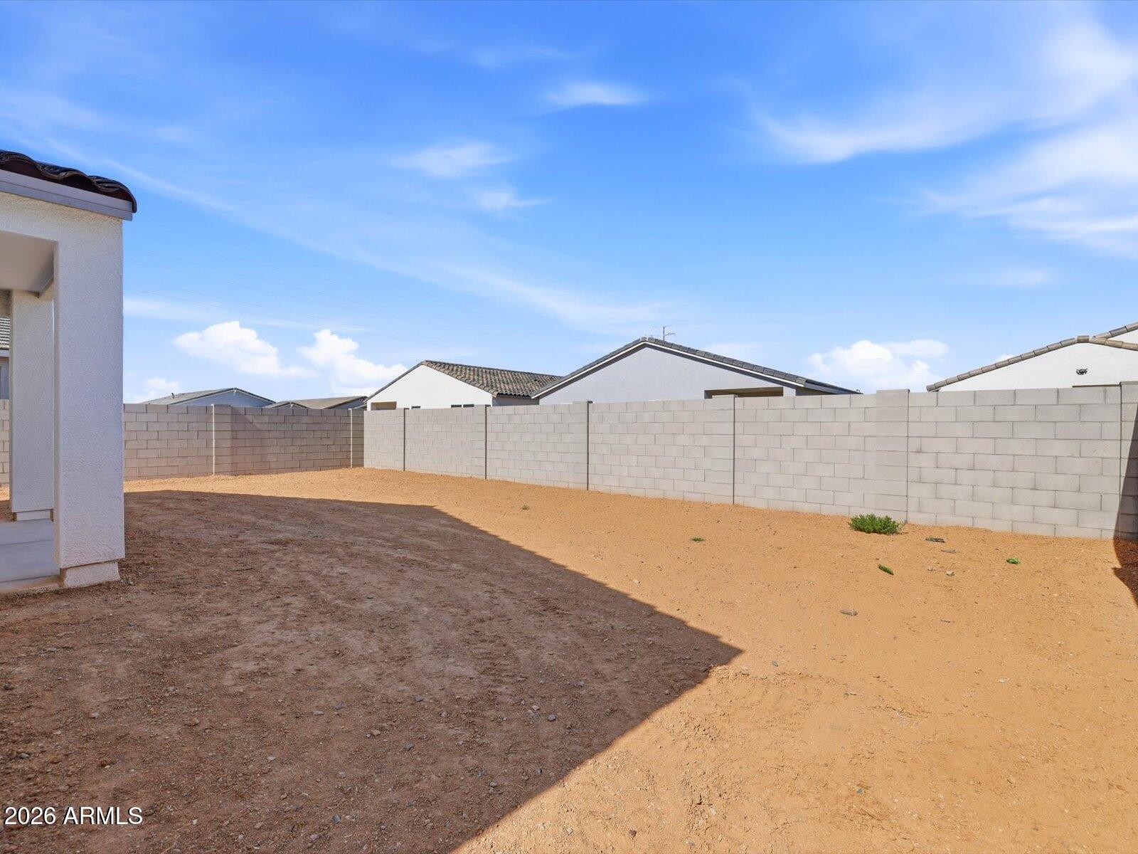 2392 Grenache Road San Tan Valley, AZ 85143 - Photo 28 of 67 a view of a backyard of the house