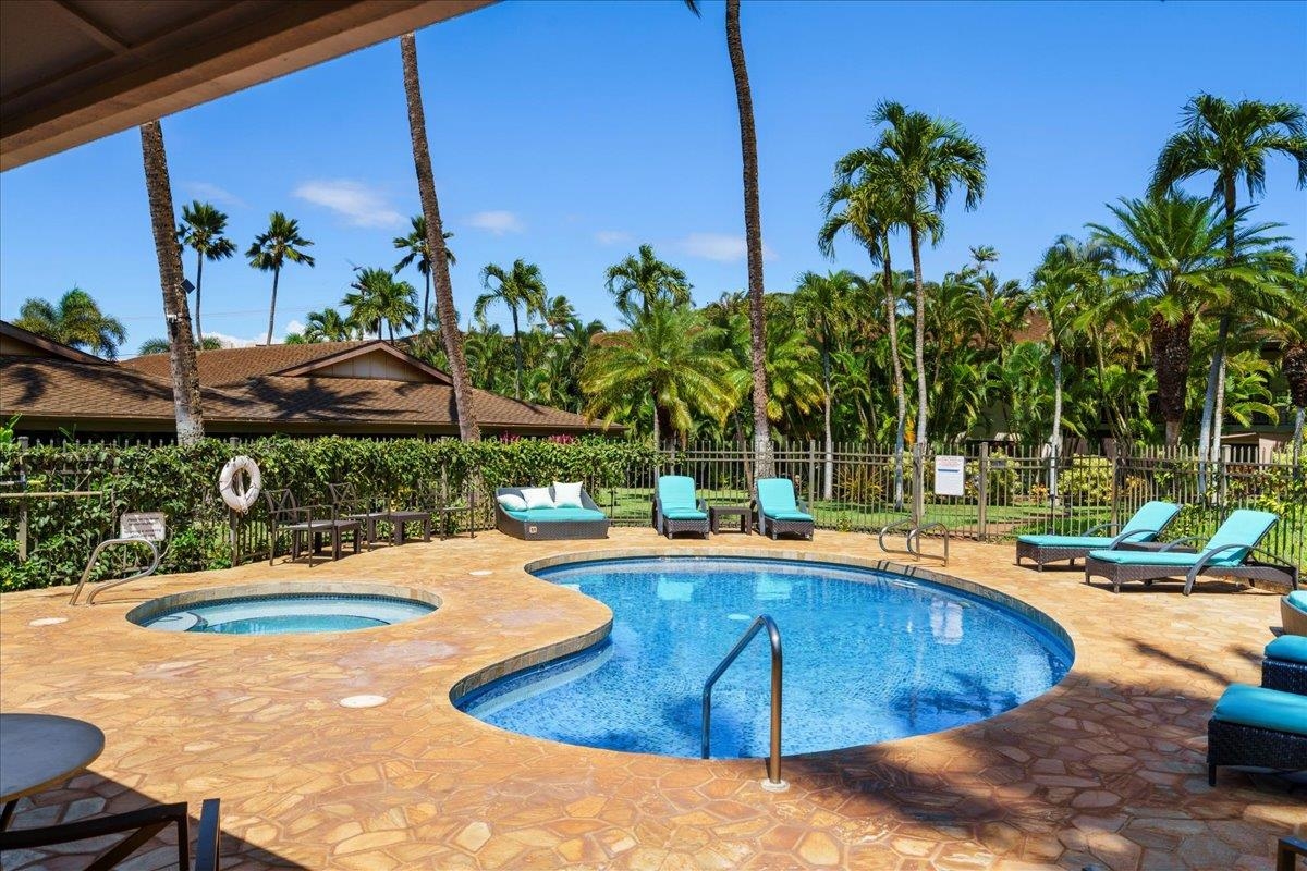 3788 Lower Honoapiilani Road, Unit A114 Lahaina, HI 96761 - Photo 5 of 18 a view of a swimming pool with a patio