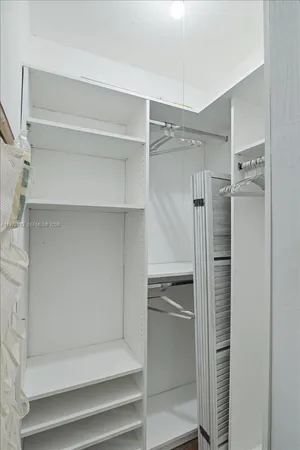 a bathroom with a shower and a stove