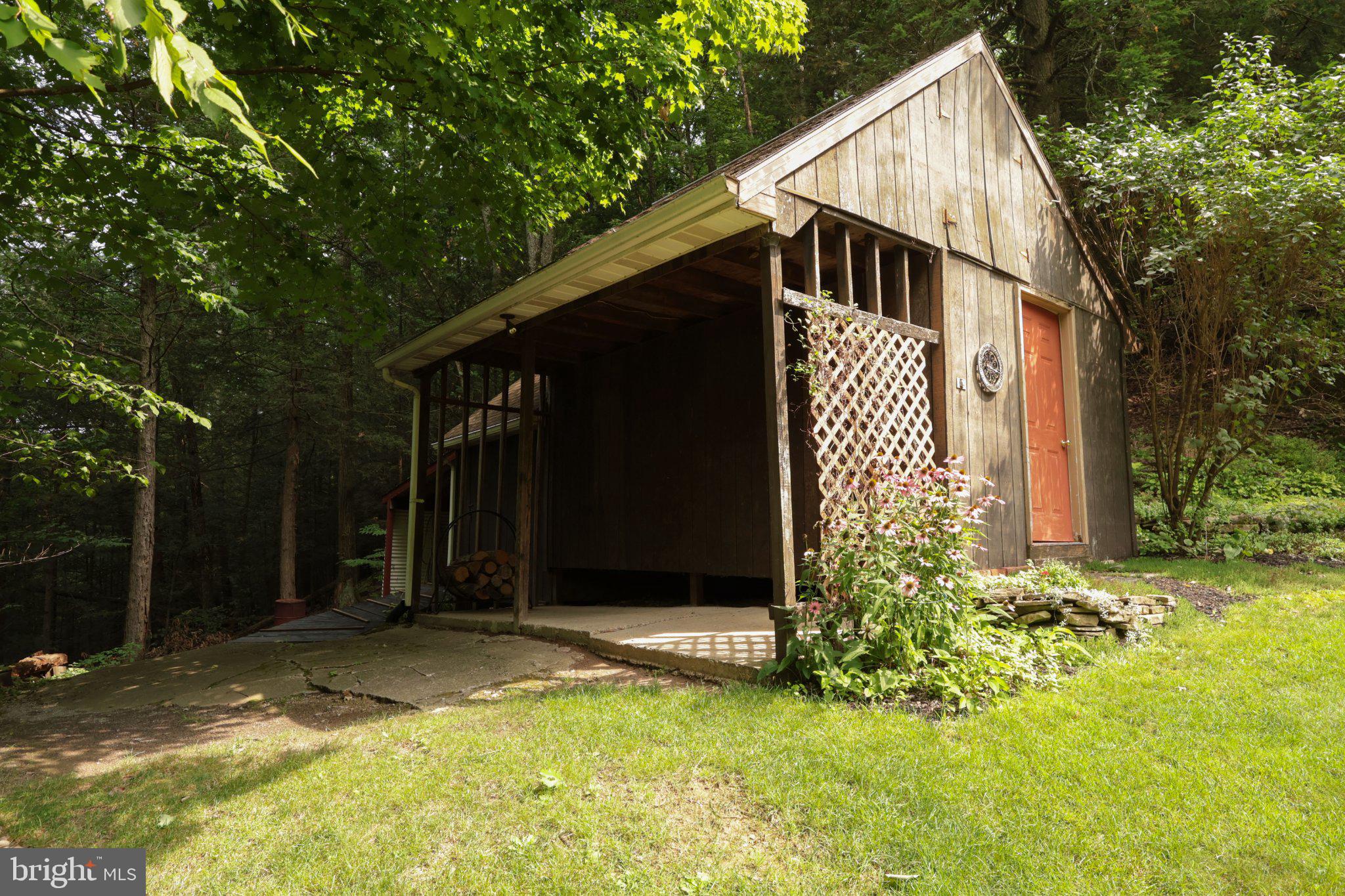 313 Jack Straw Road Julian, PA 16844 - Photo 62 of 69 Charming rustic shed in serene woods.