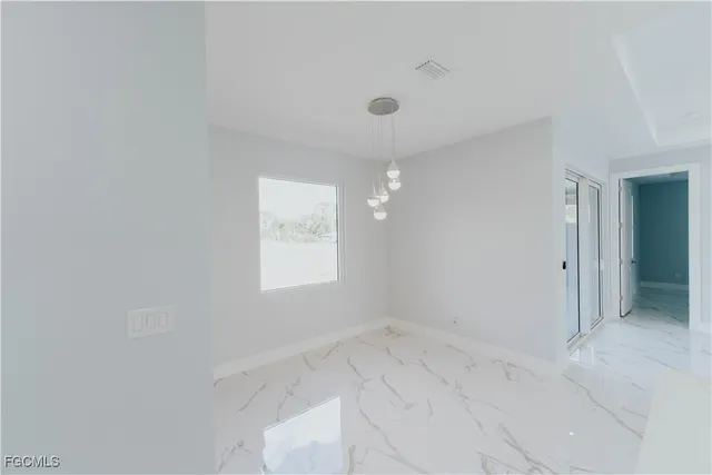 an aerial view of a house having yard