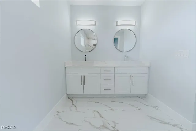 an empty room with mirror