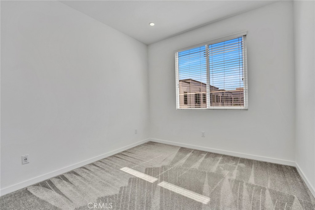 105 Schick Irvine, CA 92614 - Photo 21 of 39 a view of empty room with wooden floor and fan