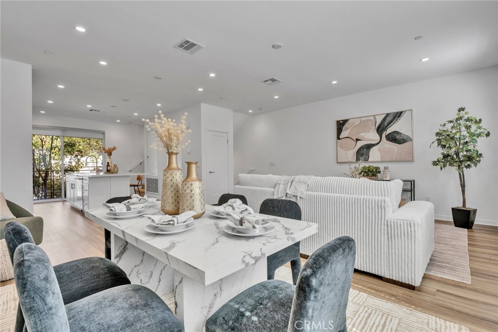 105 Schick Irvine, CA 92614 - Photo 3 of 39 a living room with furniture and wooden floor
