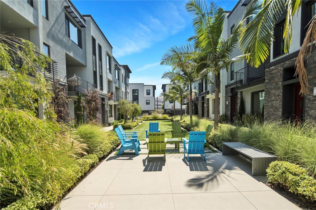 105 Schick Irvine, CA 92614 - Photo 35 of 39 a view of a patio with couches table and chairs and potted plants
