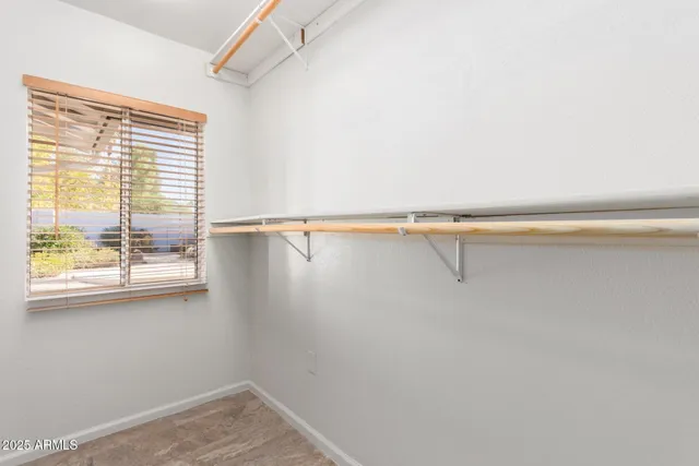 a view of a room that has a window in it