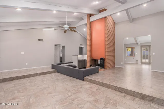 a view of a livingroom with a staircase