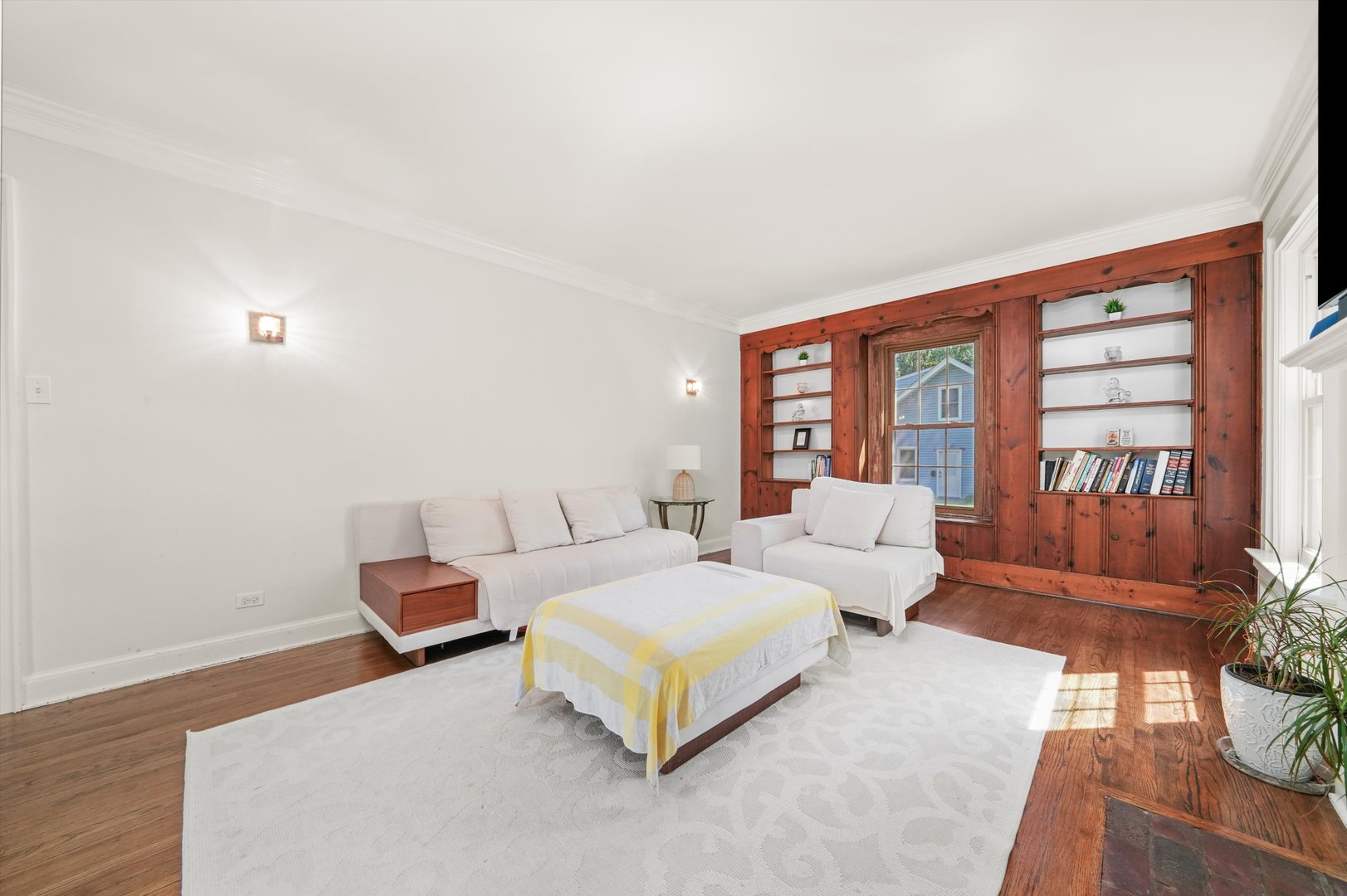 2108 Harrison Street Evanston, IL 60201 - Photo 8 of 44 a spacious bedroom with a bed couch and a large window