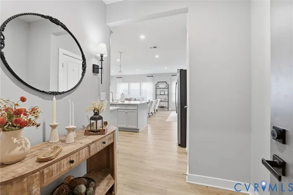 a very nice looking dining room with a table and chairs