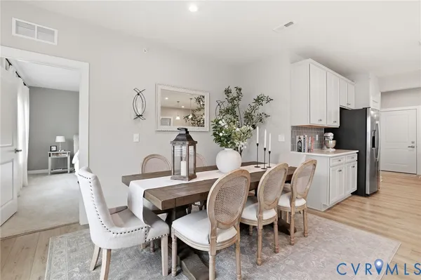 a view of a dining room with furniture