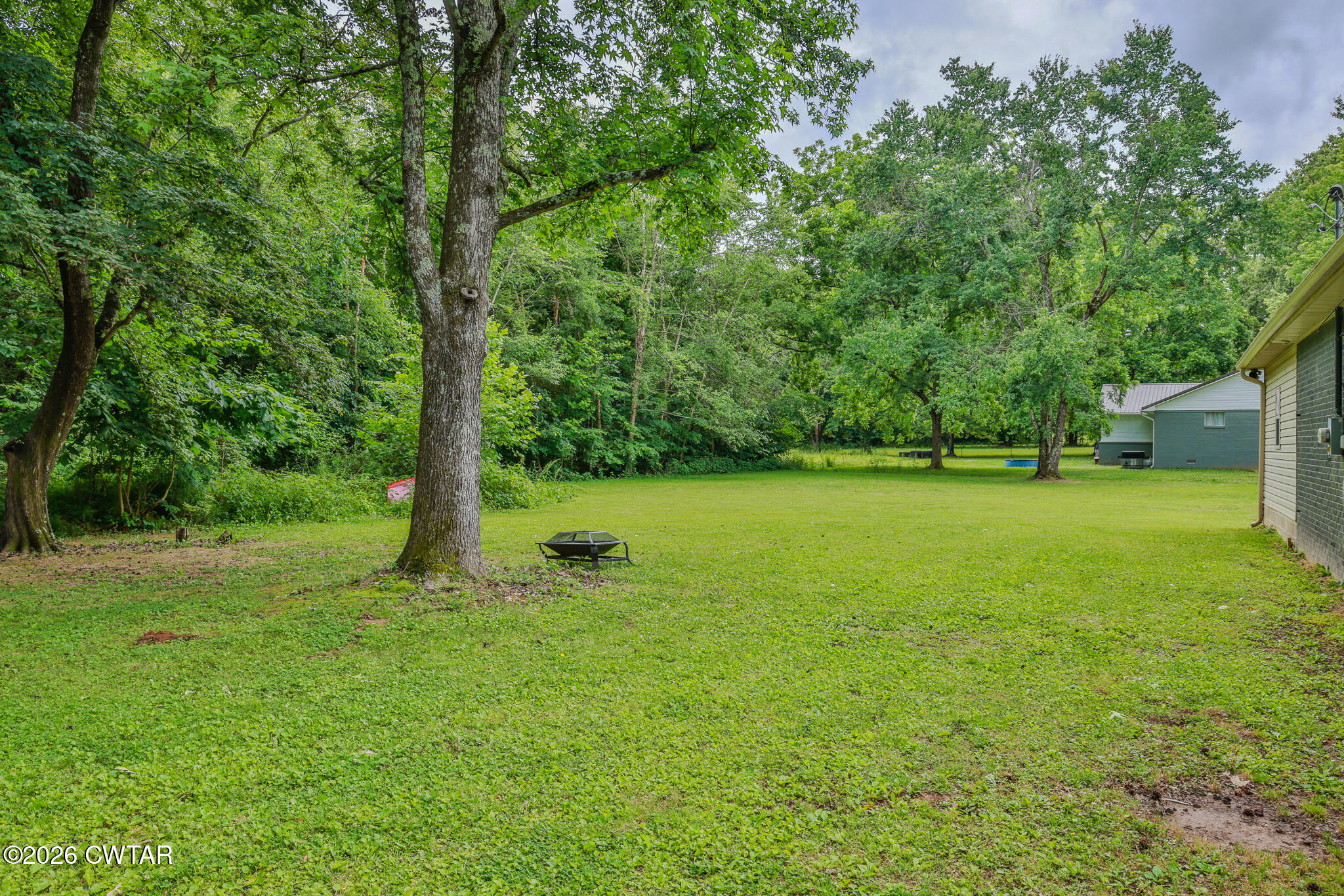 25 Shady Lane Huntingdon, TN 38344 - Photo 16 of 16 a view of a field with a tree