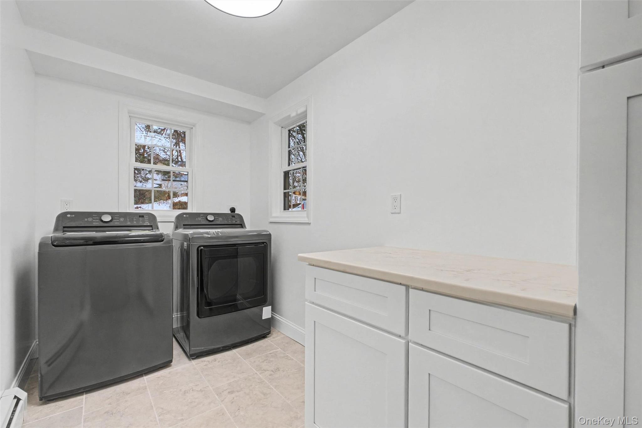 16 Cold Spring Road Putnam Valley, NY 10579 - Photo 17 of 44 a utility room with washer and dryer