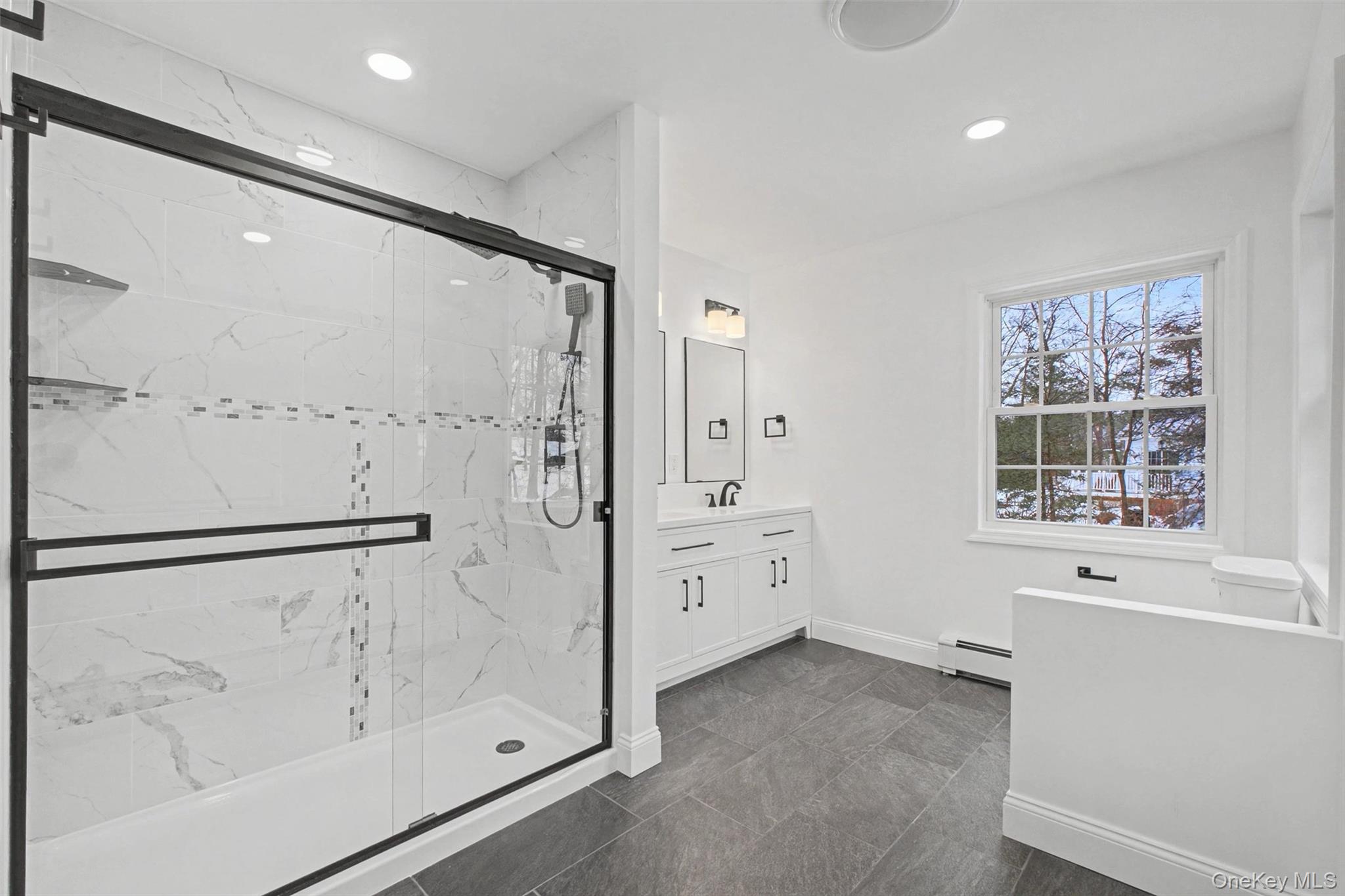 16 Cold Spring Road Putnam Valley, NY 10579 - Photo 24 of 44 a bathroom with a bathtub and a shower