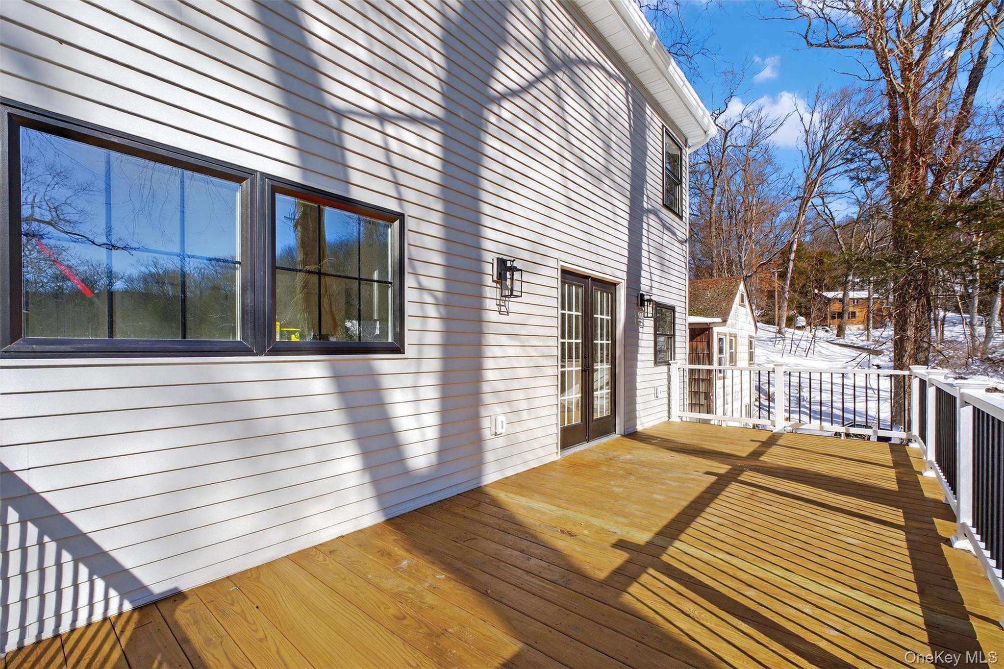 16 Cold Spring Road Putnam Valley, NY 10579 - Photo 27 of 44 a bedroom with a bed and a large window