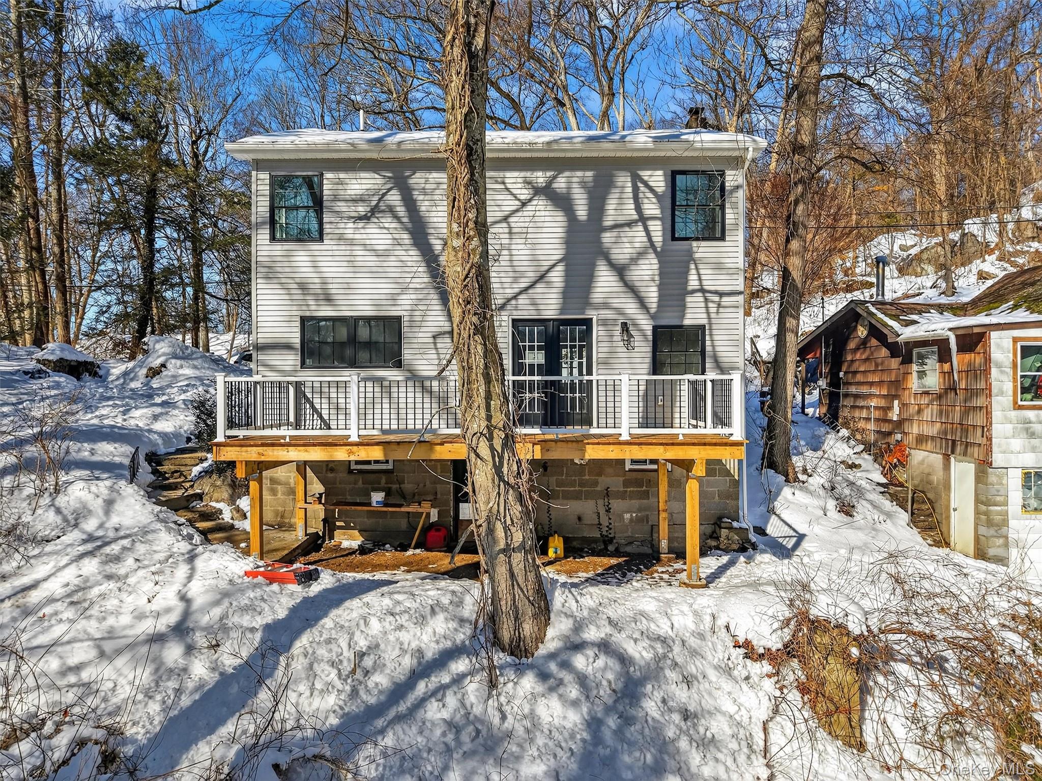 16 Cold Spring Road Putnam Valley, NY 10579 - Photo 34 of 44 a view of a house with cars park