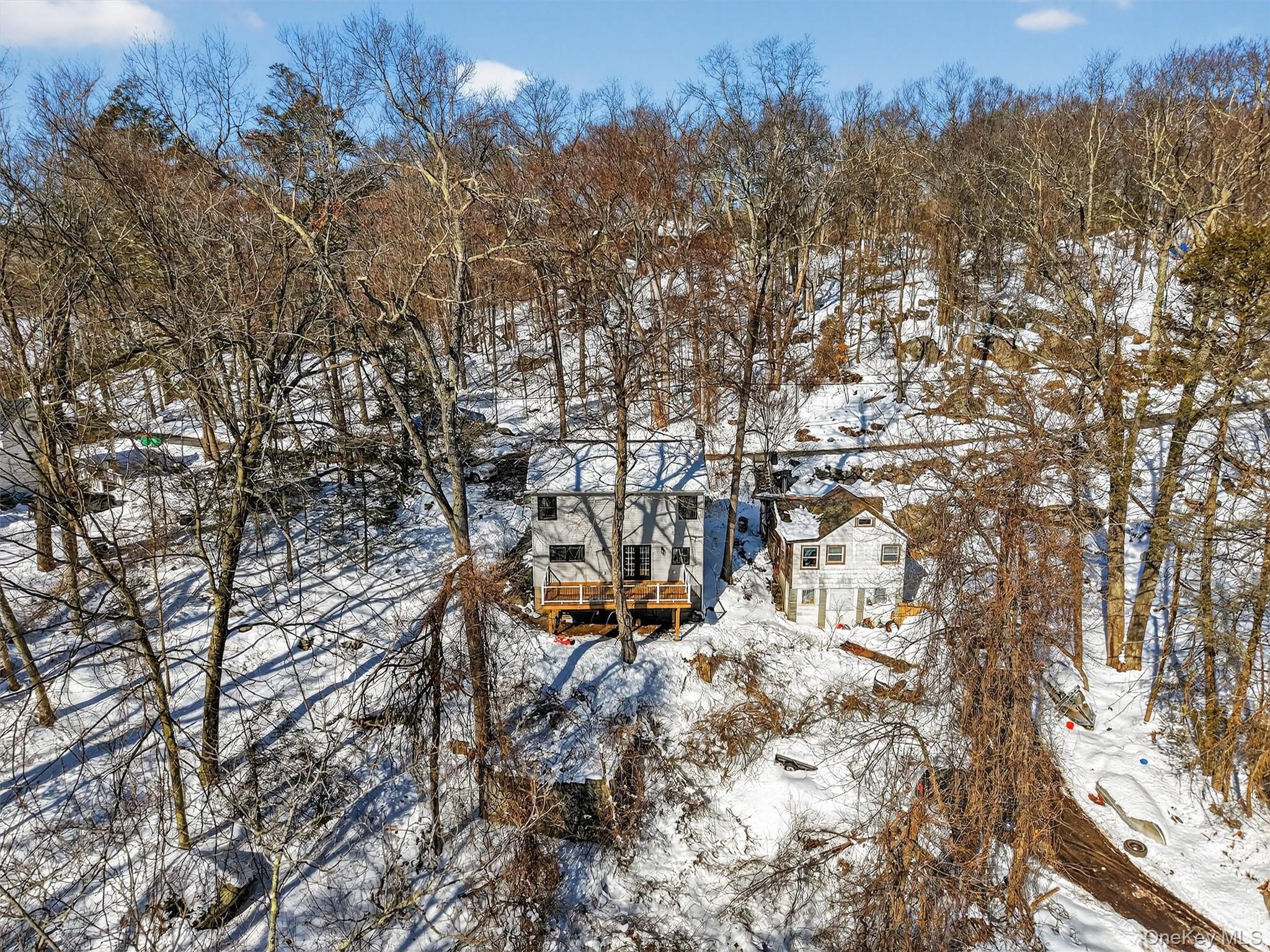 16 Cold Spring Road Putnam Valley, NY 10579 - Photo 38 of 44 a view of houses covered with snow in the background