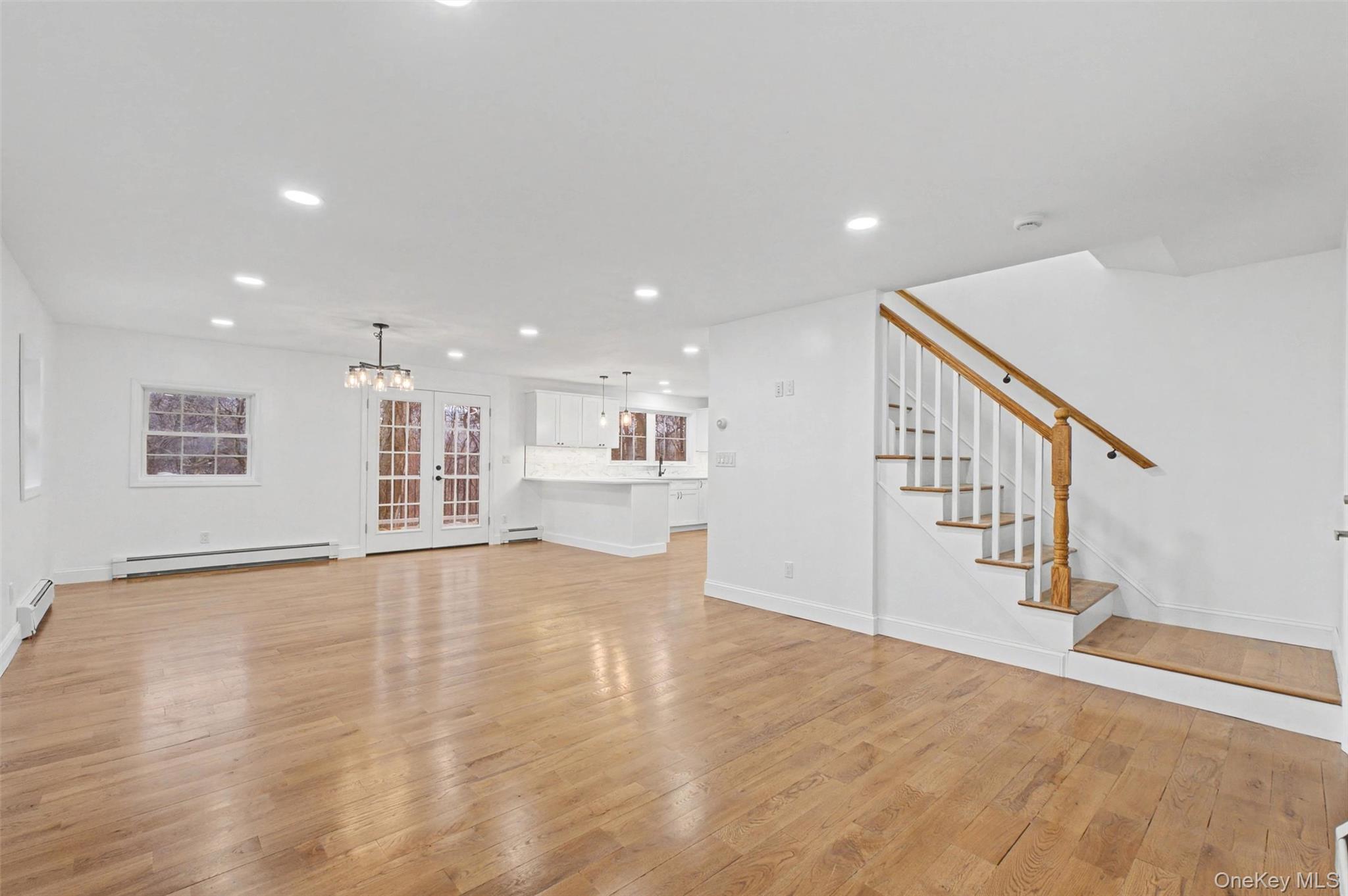 16 Cold Spring Road Putnam Valley, NY 10579 - Photo 7 of 44 a view of an empty room with wooden floor