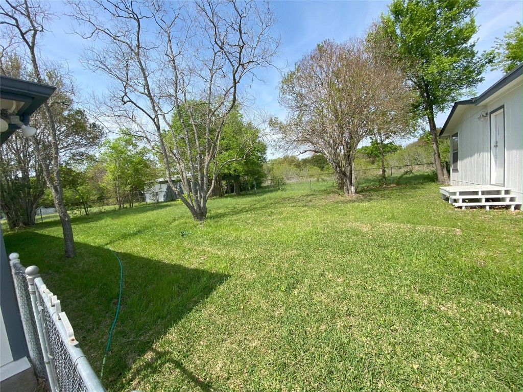 4806 Pecan Springs Road Austin, TX 78723 - Photo 17 of 20 a view of a park with large trees