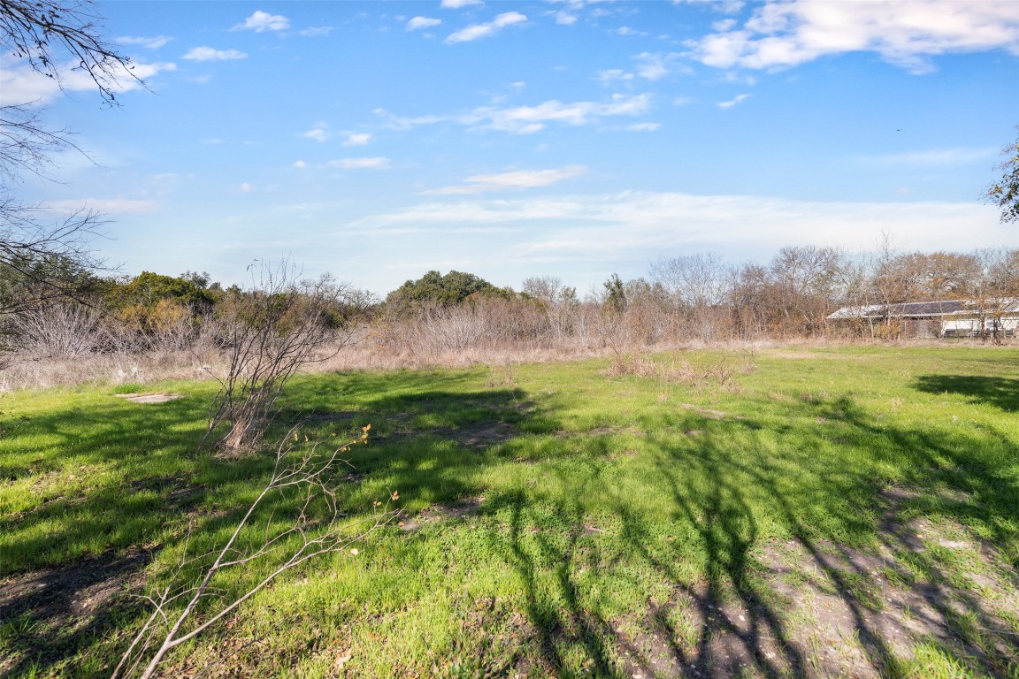 4806 Pecan Springs Road Austin, TX 78723 - Photo 9 of 20 a view of an outdoor space and a yard