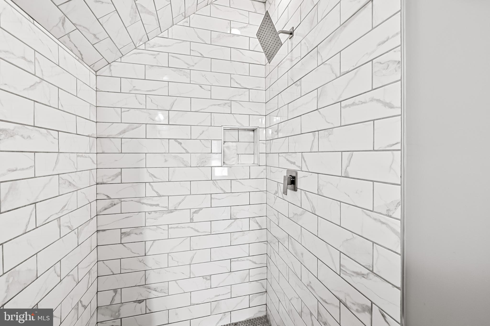709 Cedarcroft Road Baltimore, MD 21212 - Photo 28 of 38 a bathroom with a shower