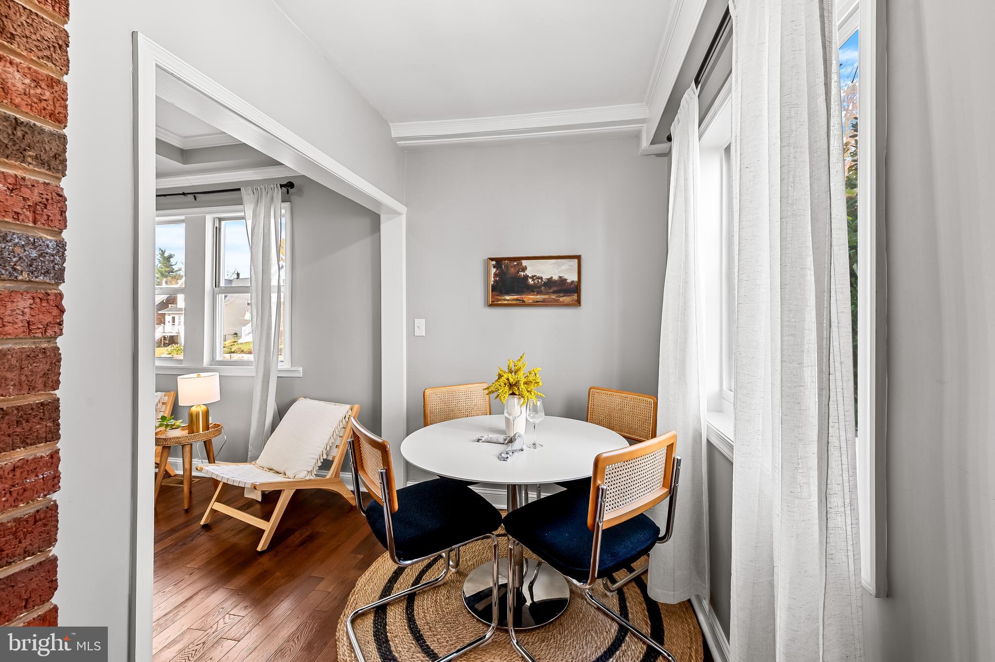 709 Cedarcroft Road Baltimore, MD 21212 - Photo 8 of 38 a view of a dining room with tables and chairs