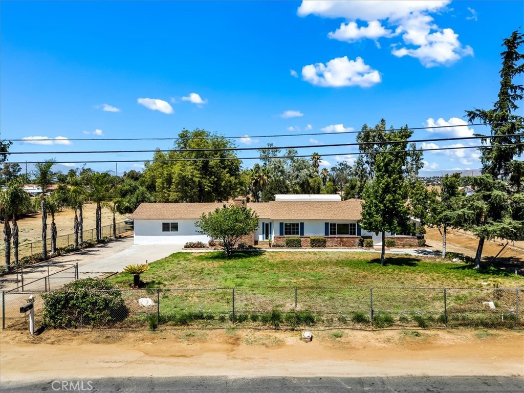 18240 Roberts Road Riverside, CA 92508 - Photo 1 of 1 a view of a house with a big yard