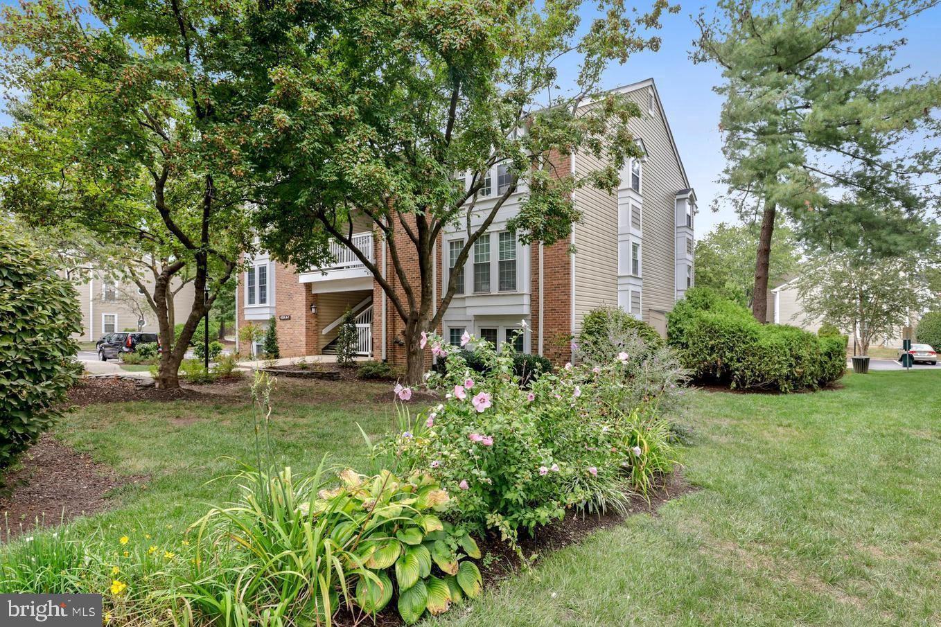 front view of a house with a garden