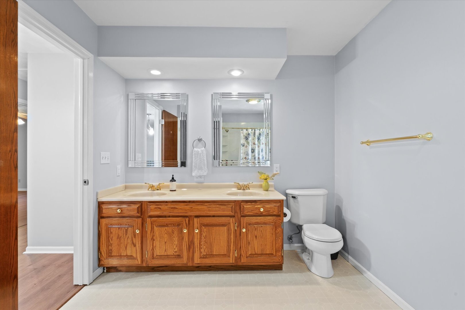 10 Oak Grove Road Geneseo, IL 61254 - Photo 22 of 43 a bathroom with a toilet sink and mirror