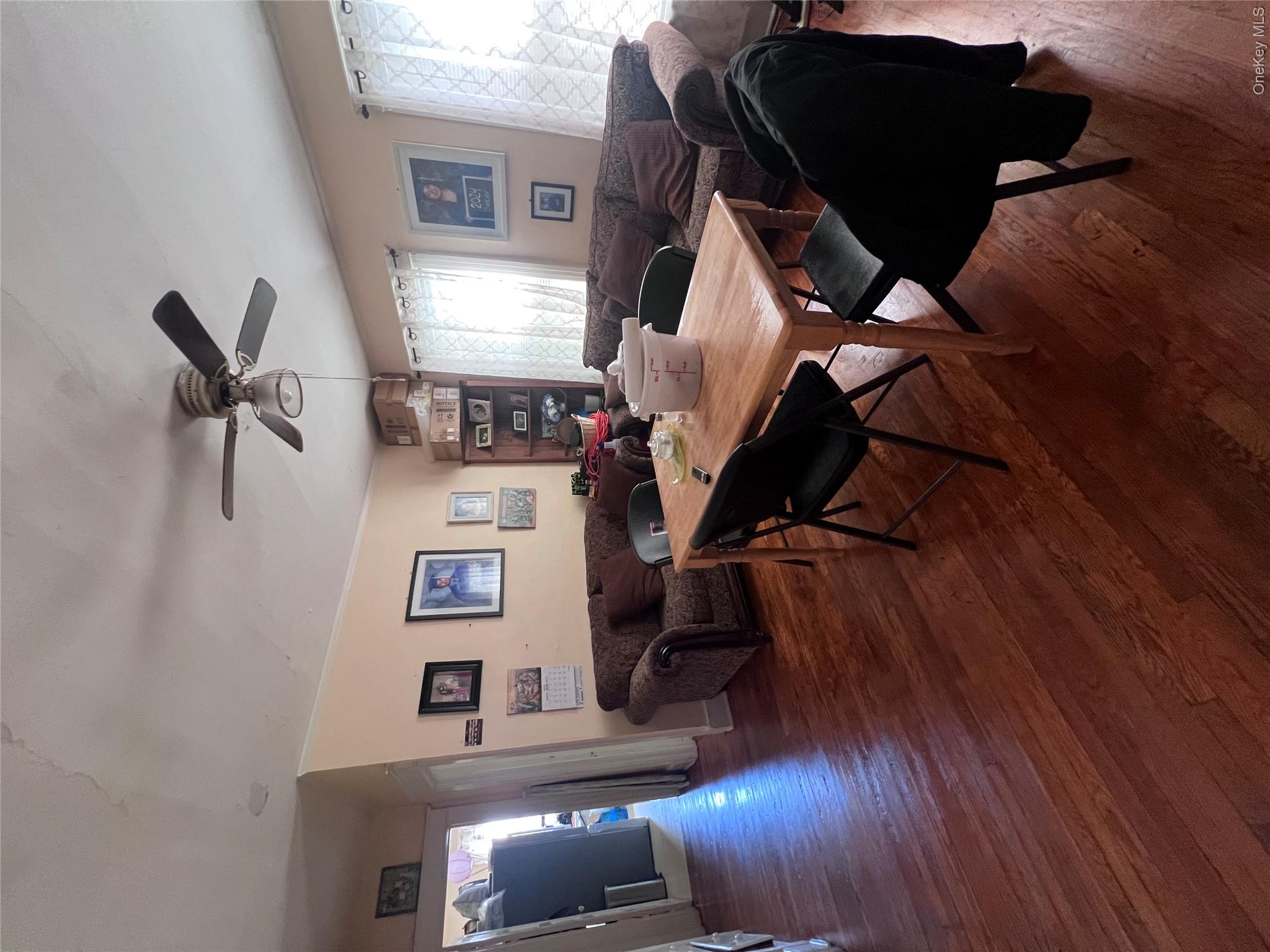 12 May Street Poughkeepsie, NY 12603 - Photo 6 of 17 a view of a dining room with furniture window and wooden floor