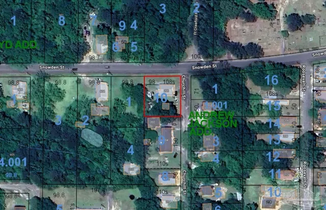 a picture of a bench in front of a building