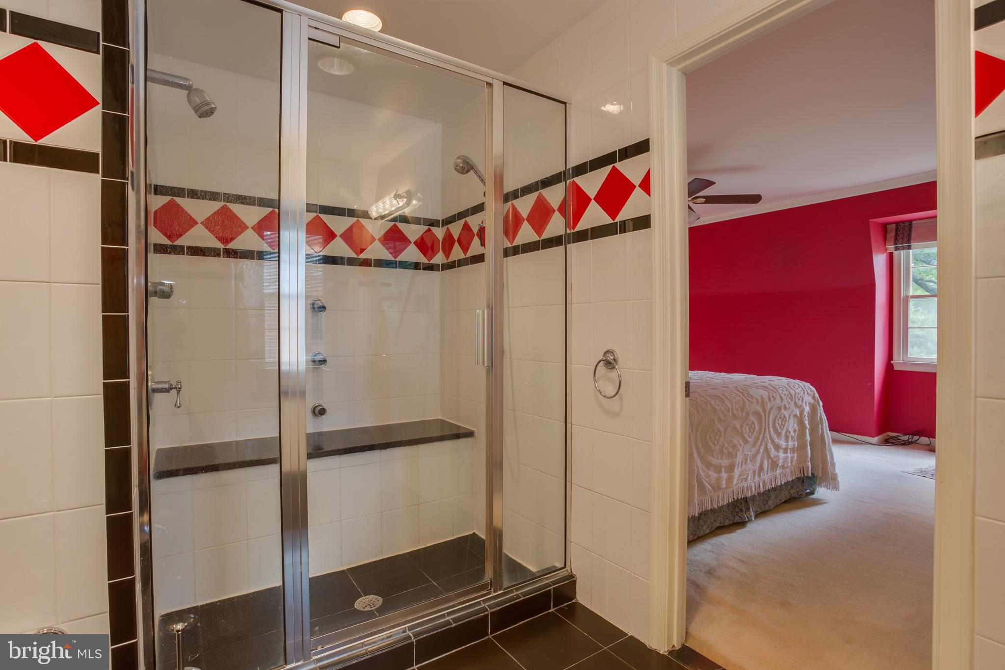 18520 Cabin Road Triangle, VA 22172 - Photo 27 of 39 Shower with wall jets, two shower heads, & bench.
