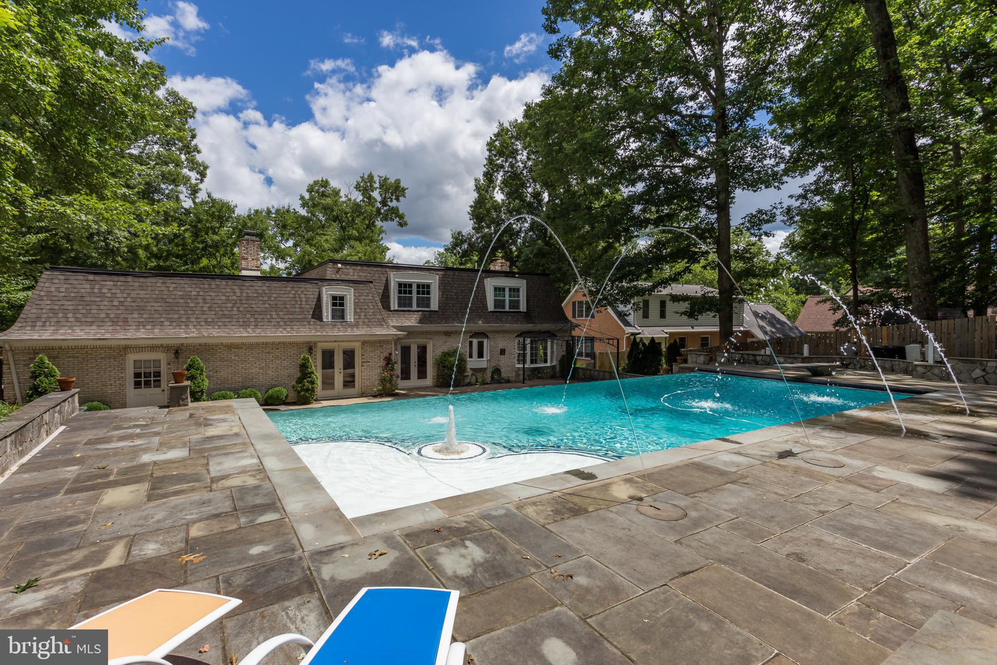 18520 Cabin Road Triangle, VA 22172 - Photo 31 of 39 Extra wide pool decking with goregous stone work.