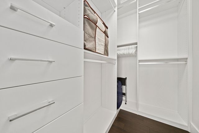 a view of an empty walk in closet