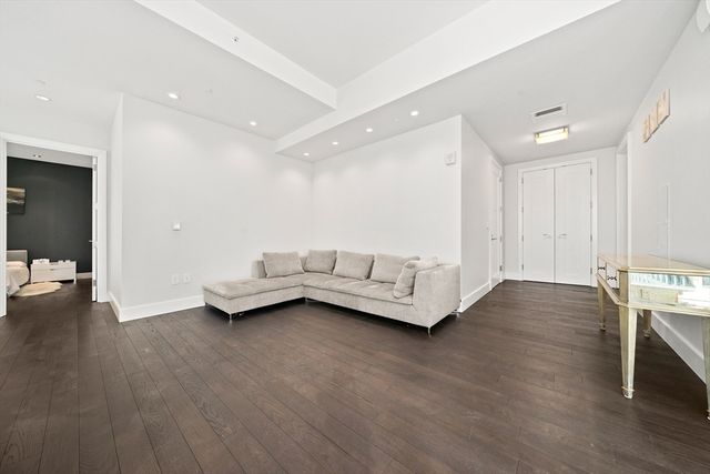 a view of livingroom with furniture and wooden floor